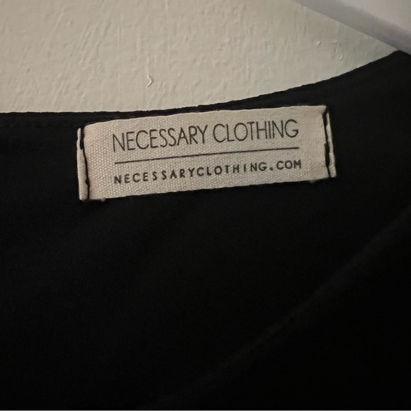 Black dress with white trim. - Picture 4 of 5